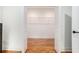Walk-in closet with hardwood floors and wire shelving at 905 Gaston Sw St, Atlanta, GA 30310