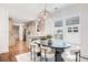 Bright dining area adjacent to the modern kitchen, featuring a stylish table and ample natural light at 905 Gaston Sw St, Atlanta, GA 30310