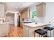 Updated kitchen with modern appliances, eat in breakfast bar and marble backsplash with ample counter space at 905 Gaston Sw St, Atlanta, GA 30310
