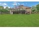 Spacious backyard with mature trees, a large deck, and plenty of room to play at 26 Trillium Ln, Acworth, GA 30101