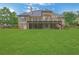 Large backyard with lush green grass, ideal for outdoor activities and recreation at 26 Trillium Ln, Acworth, GA 30101