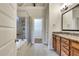 Bathroom with granite counters, double sinks, walk in closet and walk in shower at 26 Trillium Ln, Acworth, GA 30101