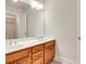 Bathroom featuring double sinks and a vanity with light wood cabinetry at 26 Trillium Ln, Acworth, GA 30101