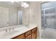Bathroom with a double sink vanity and a shower-tub combo at 26 Trillium Ln, Acworth, GA 30101