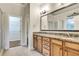Bathroom with granite counters, double sinks, walk in closet and walk in shower at 26 Trillium Ln, Acworth, GA 30101