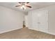 Comfortable bedroom featuring plush carpeting and a ceiling fan at 26 Trillium Ln, Acworth, GA 30101