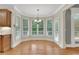 Inviting breakfast nook with many windows offering ample natural light at 26 Trillium Ln, Acworth, GA 30101