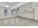 Spacious garage with epoxy floor, recessed lights, and room for two cars at 26 Trillium Ln, Acworth, GA 30101