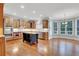 A gourmet kitchen that has hardwood floors, stone countertops, and modern appliances at 26 Trillium Ln, Acworth, GA 30101