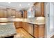 Updated kitchen with granite counters, tile backsplash, and ample cabinet space at 26 Trillium Ln, Acworth, GA 30101