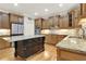 Spacious kitchen featuring a large island, custom cabinetry, and stainless steel appliances at 26 Trillium Ln, Acworth, GA 30101