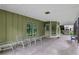 Covered patio area with seating, perfect for outdoor entertaining and relaxing at 26 Trillium Ln, Acworth, GA 30101