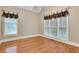 Bright room featuring hardwood floors and lots of natural light from two windows at 26 Trillium Ln, Acworth, GA 30101