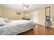 Cozy bedroom has ceiling fan and hardwood floors at 2952 N Dekalb Dr # C, Atlanta, GA 30340