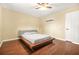 Stylish bedroom has ceiling fan and gleaming hardwood floors at 2952 N Dekalb Dr # C, Atlanta, GA 30340