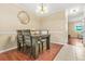 Cozy dining area with a wooden table, seating for four, and view of the living room at 2952 N Dekalb Dr # C, Atlanta, GA 30340