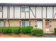 Exterior view of a townhome showcasing brick facade and manicured front yard at 2952 N Dekalb Dr # C, Atlanta, GA 30340