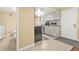 Galley kitchen boasts new cabinets, stainless sink, and modern appliances at 2952 N Dekalb Dr # C, Atlanta, GA 30340