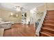 Bright living room with hardwood floors, a ceiling fan, and a comfortable leather couch at 2952 N Dekalb Dr # C, Atlanta, GA 30340