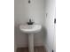 Bathroom featuring a pedestal sink with modern fixtures and clean white walls at 3106 Marbella Cir # 3, Kennesaw, GA 30152