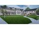 A vibrant community scene with residents enjoying a fire pit and lawn games at 3106 Marbella Cir # 3, Kennesaw, GA 30152