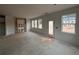 Unfinished new living room featuring a wall with wooden accents and lots of natural light at 3106 Marbella Cir # 3, Kennesaw, GA 30152