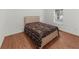 Bedroom with a bed, natural light, and wood-look flooring at 3898 Heritage Oaks Dr, Powder Springs, GA 30127