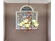 Elegant chandelier hangs in front of a window, highlighting the home's architectural details at 3898 Heritage Oaks Dr, Powder Springs, GA 30127