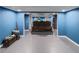 Finished basement with a large projection screen creating an ideal entertainment space at 3898 Heritage Oaks Dr, Powder Springs, GA 30127