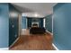 Spacious living room featuring a cozy fireplace and hardwood floors at 3898 Heritage Oaks Dr, Powder Springs, GA 30127