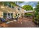 The deck showcases a comfortable seating area, outdoor dining gazebo, and a well-manicured backyard, perfect for relaxing at 540 Shale Ct, Alpharetta, GA 30022