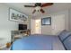 Bedroom with a bed, TV, neutral colors, and carpeted floor at 540 Shale Ct, Alpharetta, GA 30022