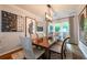 Elegant dining room featuring stylish decor and a large window view at 540 Shale Ct, Alpharetta, GA 30022