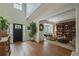 Inviting foyer with hardwood floors, showcasing a living room, and natural light at 540 Shale Ct, Alpharetta, GA 30022