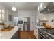 Modern kitchen with stainless steel appliances, sleek cabinets, and a functional center island at 540 Shale Ct, Alpharetta, GA 30022