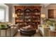 Inviting living room with built-in shelving and comfortable seating arrangement at 540 Shale Ct, Alpharetta, GA 30022