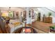Bright, open-concept living room with hardwood floors and comfortable seating arrangement at 540 Shale Ct, Alpharetta, GA 30022