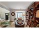 Cozy living area with a large bookcase and comfortable reading nook at 540 Shale Ct, Alpharetta, GA 30022