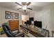 Office space with an executive chair, wooden desk, and framed pictures on the wall at 540 Shale Ct, Alpharetta, GA 30022