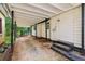 Carport featuring a concrete foundation and a wood slat roof at 1192 Arlington Sw Ave, Atlanta, GA 30310