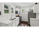 Bright kitchen featuring modern appliances, white cabinets, and ample counter space at 1192 Arlington Sw Ave, Atlanta, GA 30310