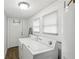 A laundry room area featuring a washer and dryer and a water heater at 1192 Arlington Sw Ave, Atlanta, GA 30310