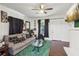 Comfortable living room with green rug, plush seating, and a cozy atmosphere at 1192 Arlington Sw Ave, Atlanta, GA 30310