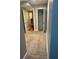 Spacious bedroom with neutral carpet and access to a closet and hallway at 2855 Peachtree Ne Rd # 106, Atlanta, GA 30305