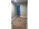 Bedroom featuring soft carpet, neutral walls, and a doorway to another room at 2855 Peachtree Ne Rd # 106, Atlanta, GA 30305