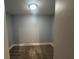 A cozy closet with neutral colored walls and carpeting at 2855 Peachtree Ne Rd # 106, Atlanta, GA 30305