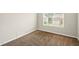 Neutral bedroom with a window allowing natural light at 3731 Laramie Rd, Ellenwood, GA 30294