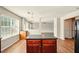 Spacious kitchen island with laminate floors and modern appliances at 3731 Laramie Rd, Ellenwood, GA 30294