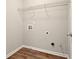 Functional laundry room with wire shelving at 3731 Laramie Rd, Ellenwood, GA 30294