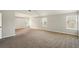 Oversized main bedroom with large windows and vaulted ceiling at 3731 Laramie Rd, Ellenwood, GA 30294